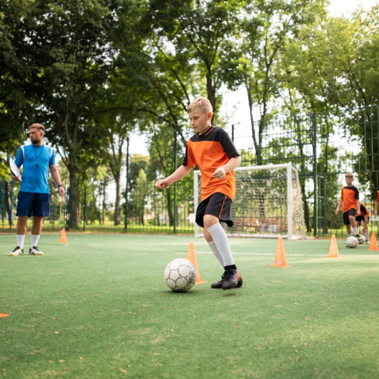 football-trainer-teaching-his-pupils