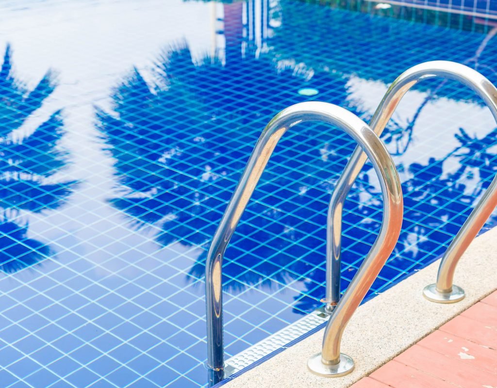 Stair swimming pool in beautiful luxury hotel pool resort - boost color up processing style